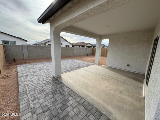 39995 West Agave Road Maricopa, AZ 85138 - Photo 20 of 26 a view of a hallway