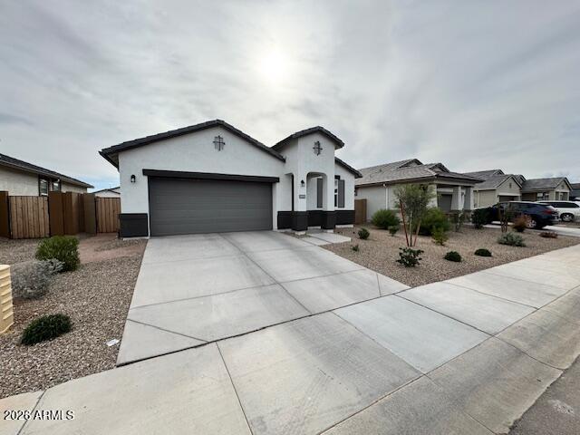 39995 West Agave Road Maricopa, AZ 85138 - Photo 2 of 26 a house view with a outdoor space