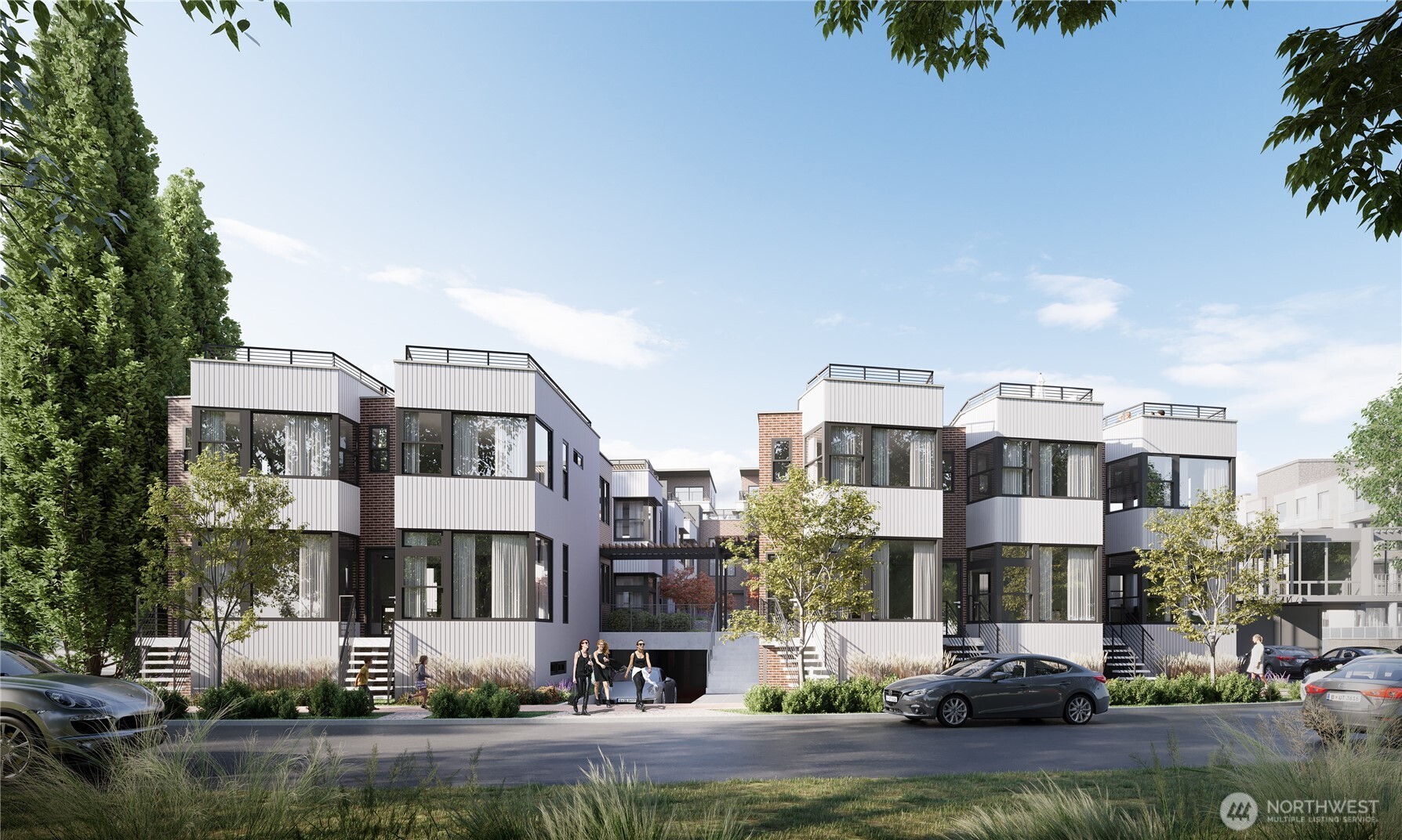 2018 Fairview Avenue East, Unit B Seattle, WA 98102 - Photo 1 of 17 a front view of a residential apartment building with a yard and parking space