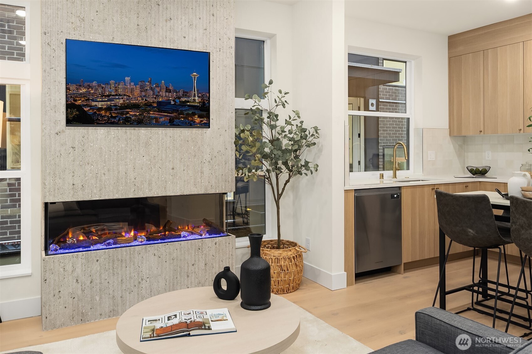 2018 Fairview Avenue East, Unit B Seattle, WA 98102 - Photo 9 of 17 a living room with furniture and a fireplace