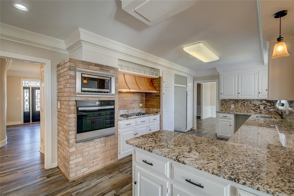 7359 Highway 154 Sulphur Springs, TX 75482 - Photo 15 of 40 View from breakfast bar; double pantry cabinets, tons of cabinet space