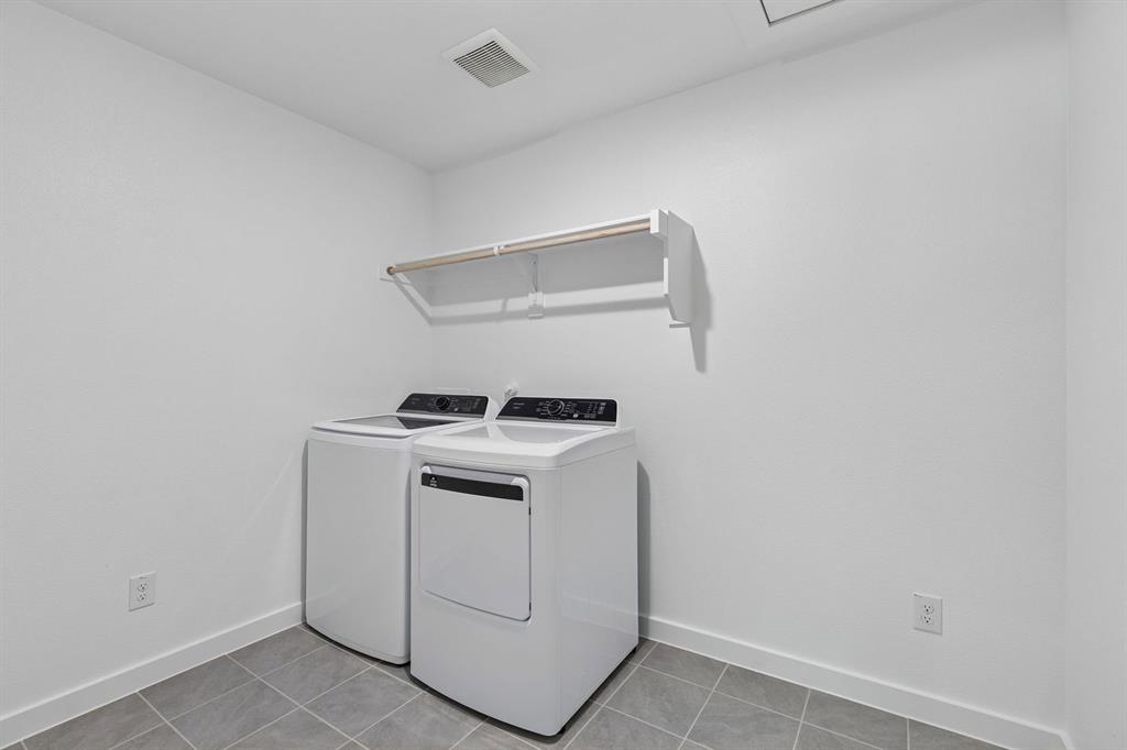 671 Sierra Ridge Lavon, TX 75166 - Photo 16 of 33 a utility room with dryer and washer
