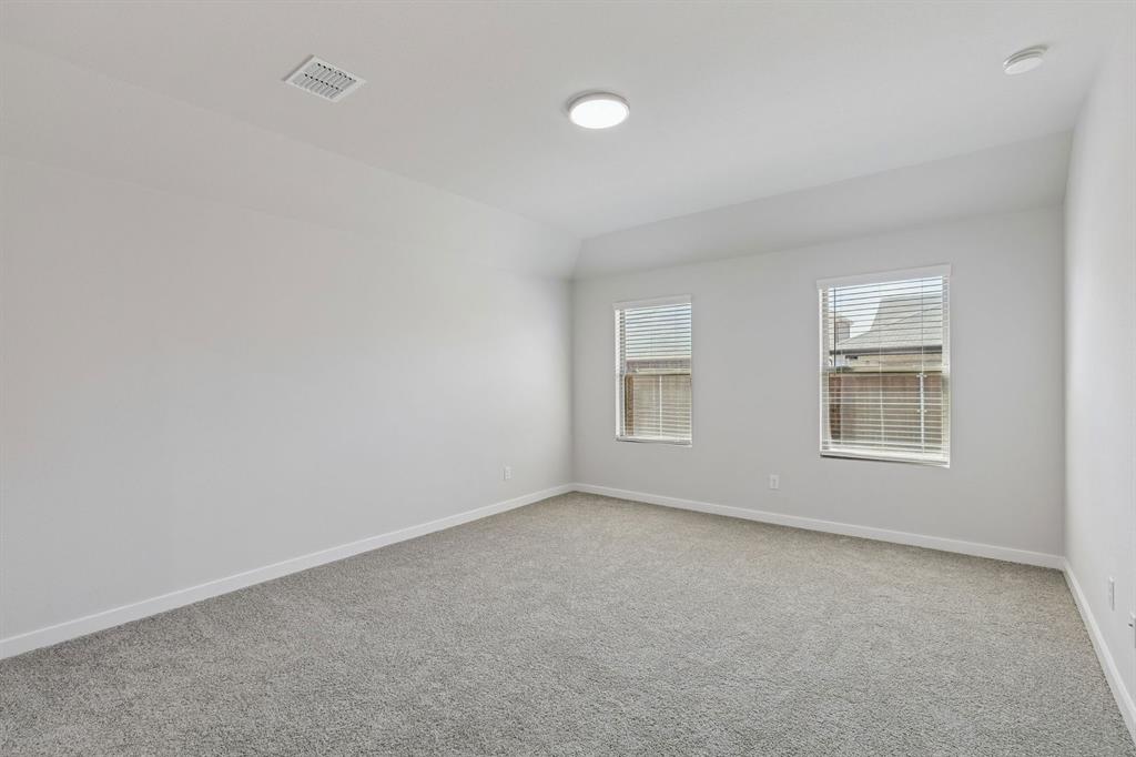 671 Sierra Ridge Lavon, TX 75166 - Photo 17 of 33 an empty room with windows
