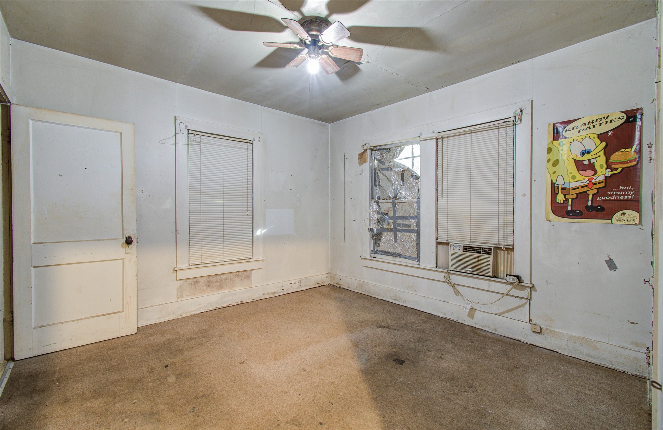 1003 Prairie Street Columbus, TX 78934 - Photo 13 of 29 a view of an empty room with a window