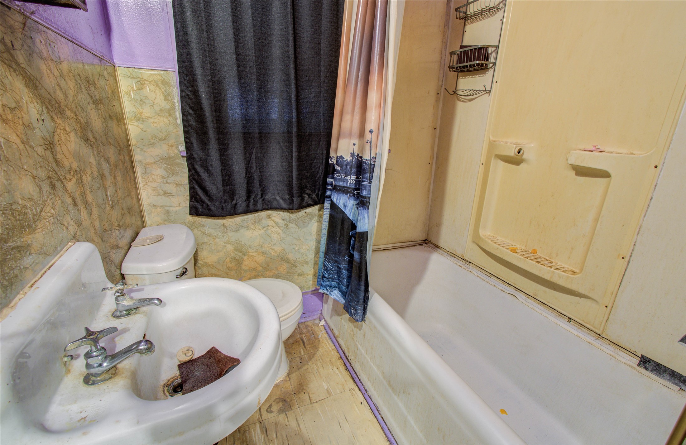1003 Prairie Street Columbus, TX 78934 - Photo 15 of 29 a bathroom with a sink and a tub
