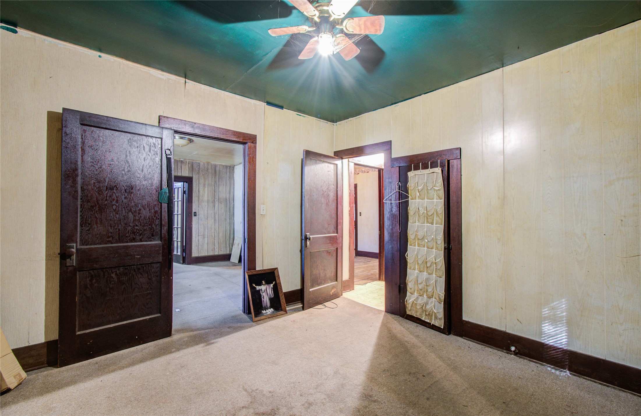 1003 Prairie Street Columbus, TX 78934 - Photo 20 of 29 a view of a hallway with entryway and chandelier