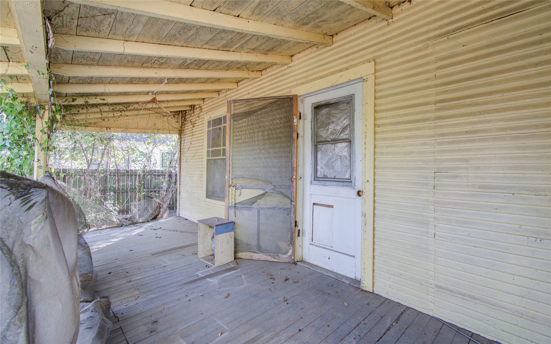 1003 Prairie Street Columbus, TX 78934 - Photo 26 of 29 a view of a room with wooden floor and furniture