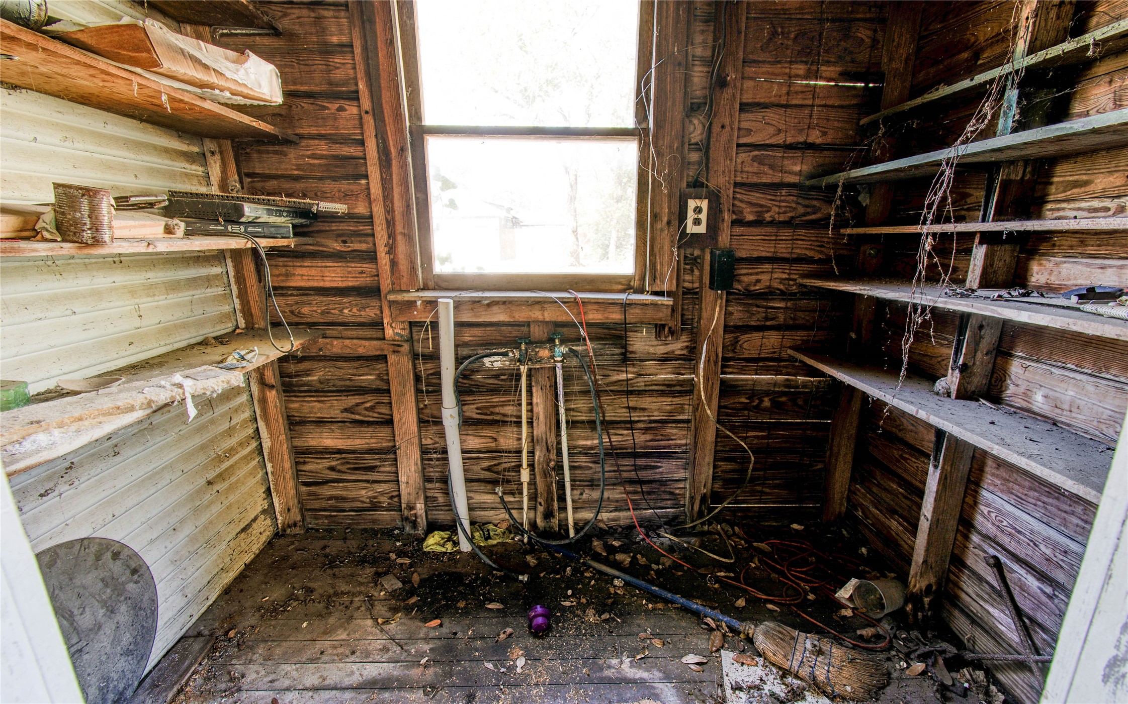 1003 Prairie Street Columbus, TX 78934 - Photo 27 of 29 a view of walk in closet with clothes and shoes