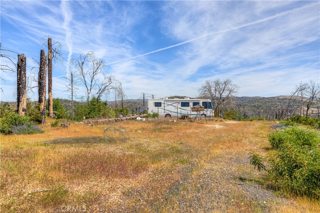 49 Indian Cemetery Road Berry Creek, CA 95916 - Photo 7 of 20 a swimming pool with outdoor seating and yard