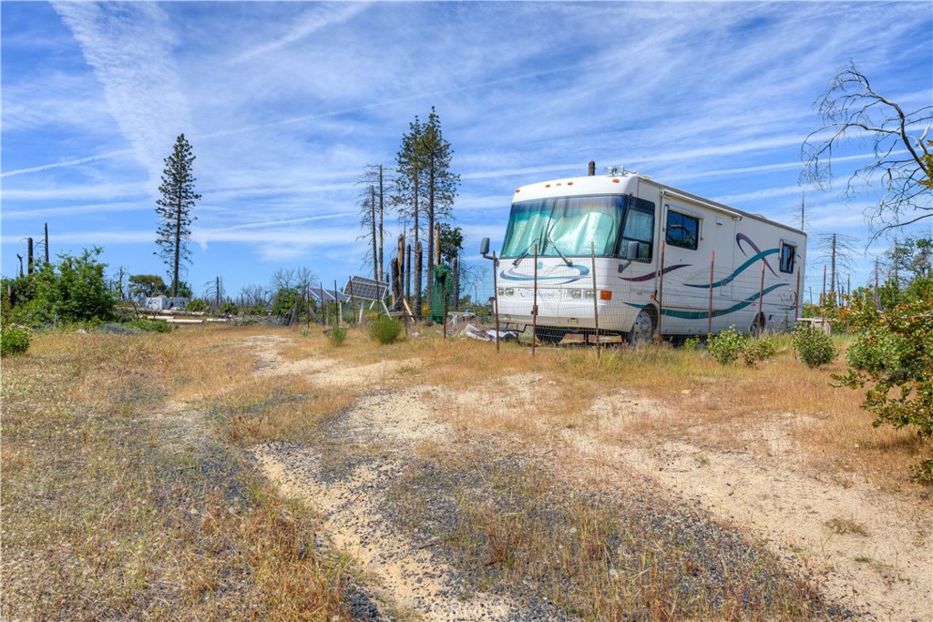 49 Indian Cemetery Road Berry Creek, CA 95916 - Photo 9 of 20 a view of a house with a yard