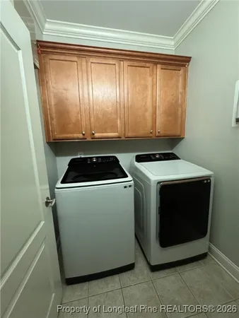 a utility room with washer and dryer