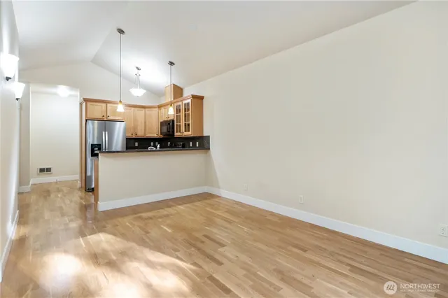 a view of a kitchen and a window