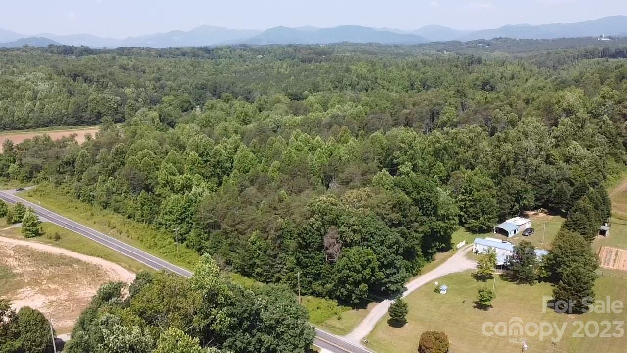 359 Parris Road Rutherfordton, NC 28139 - Photo 1 of 17 a view of a mountain from a yard