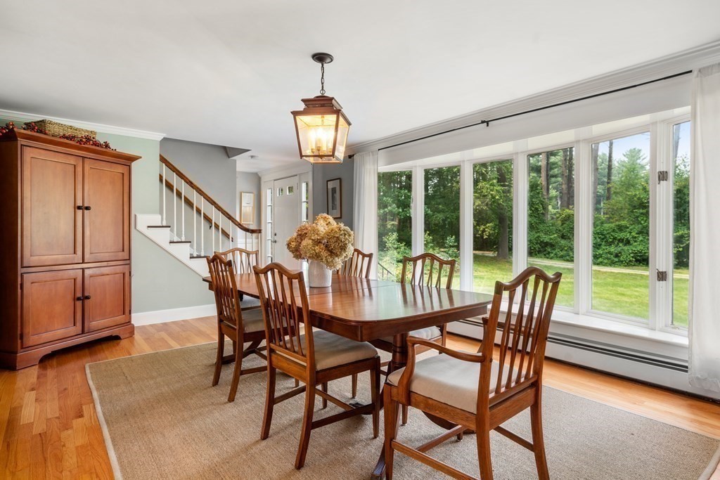 114 Still River Road Harvard, MA 01451 - Photo 11 of 42 a view of a dining room with furniture window and wooden floor