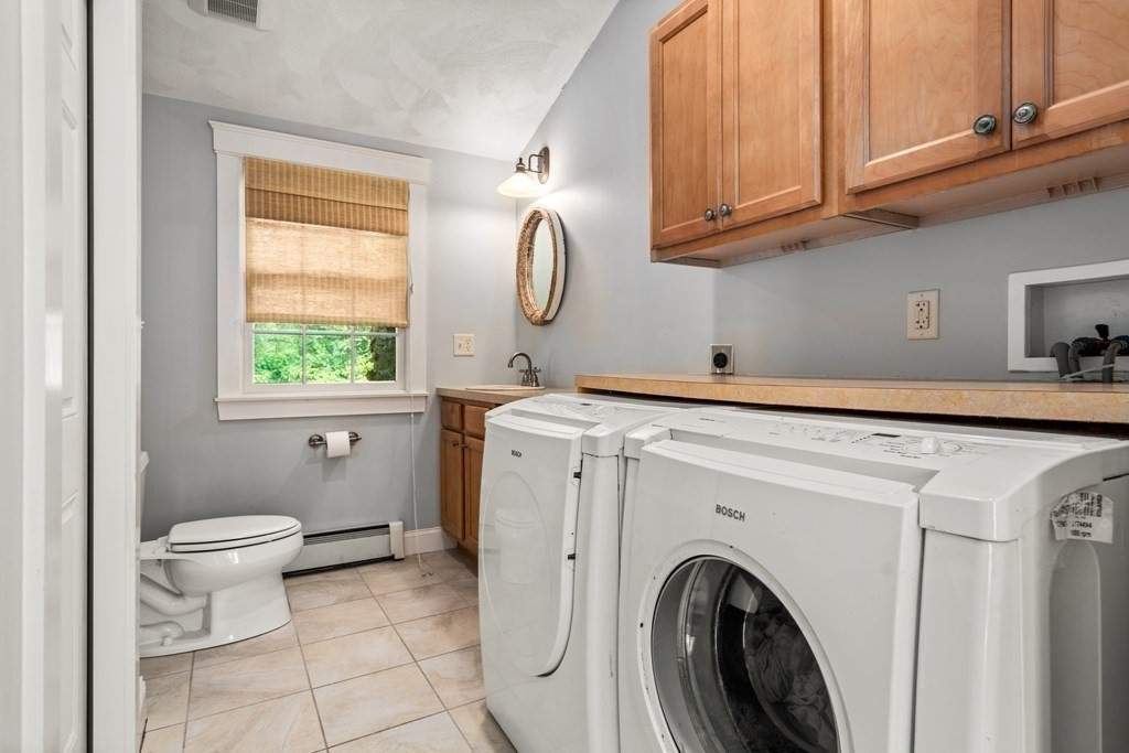 114 Still River Road Harvard, MA 01451 - Photo 21 of 42 a view of bathroom with washing machine and sink