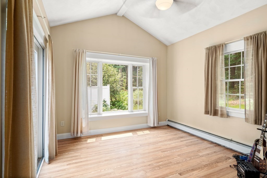 114 Still River Road Harvard, MA 01451 - Photo 35 of 42 a view of an empty room with wooden floor and a window