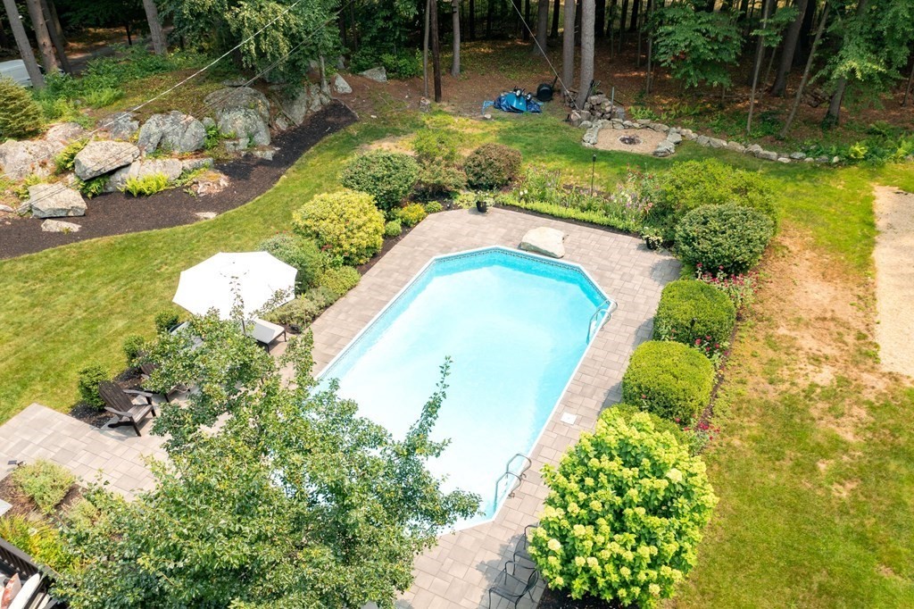114 Still River Road Harvard, MA 01451 - Photo 40 of 42 a view of a lake with a building in the background