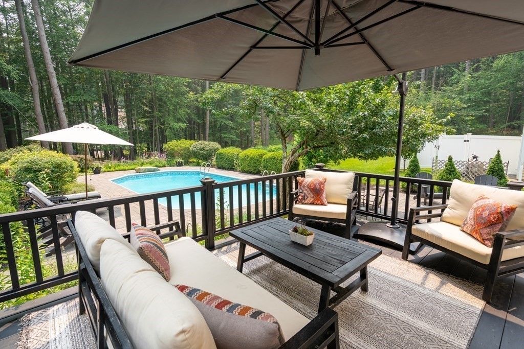 114 Still River Road Harvard, MA 01451 - Photo 5 of 42 a view of a patio with furniture and a umbrella
