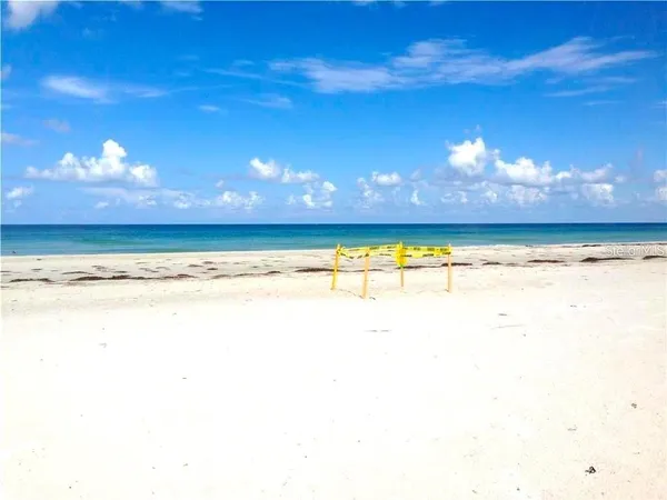 a view of ocean with beach