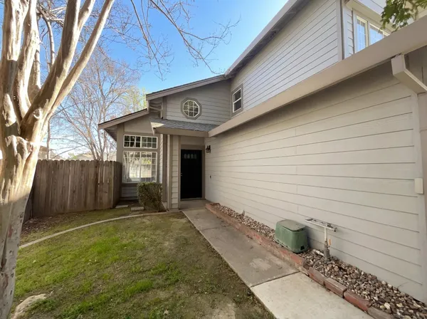 a view of a backyard with a garden