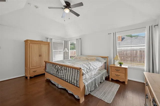 a bed room with a bed and a window