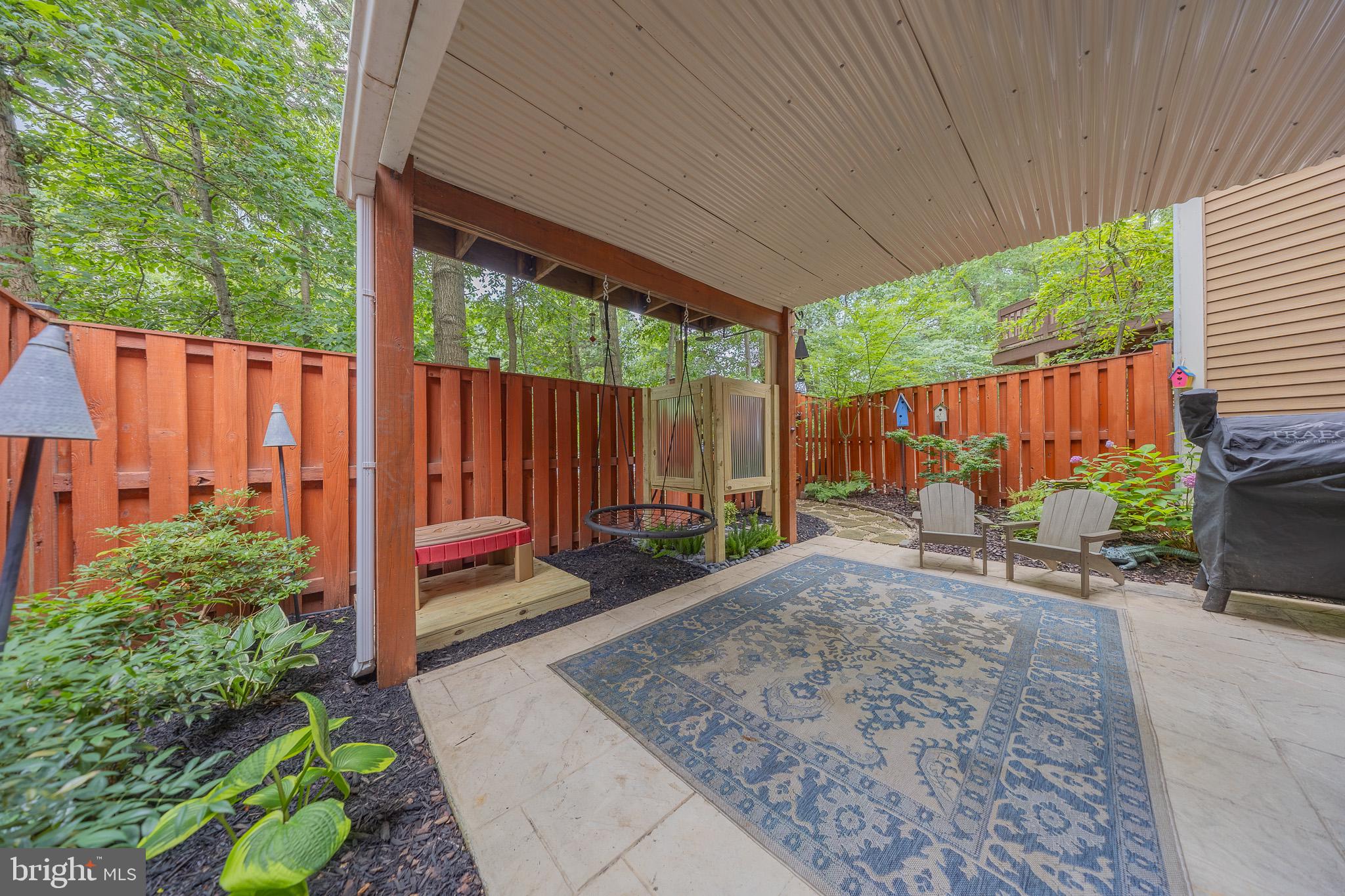 11287 Silentwood Lane Reston, VA 20191 - Photo 2 of 21 Private back patio backs to trees