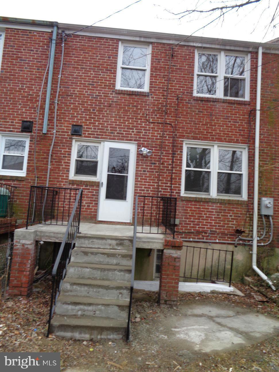 827 Wedgewood Road Baltimore, MD 21229 - Photo 22 of 22 a front view of a house with stairs