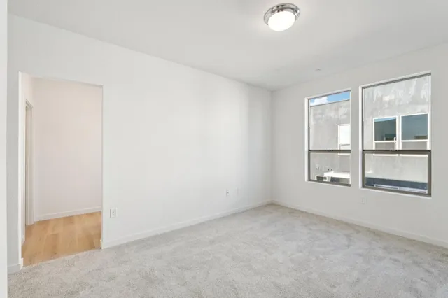 an empty room with windows