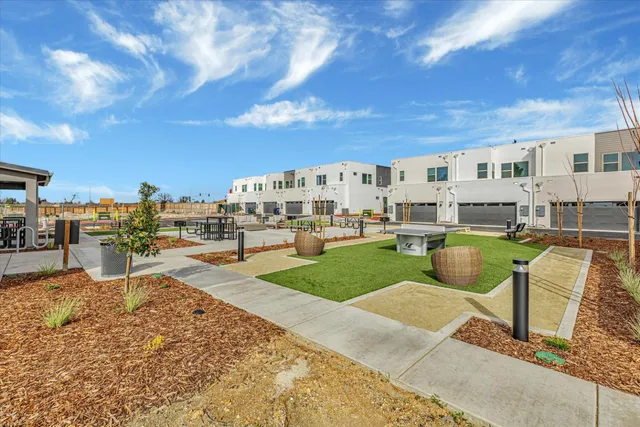 a view of a swimming pool with a lounge chairs