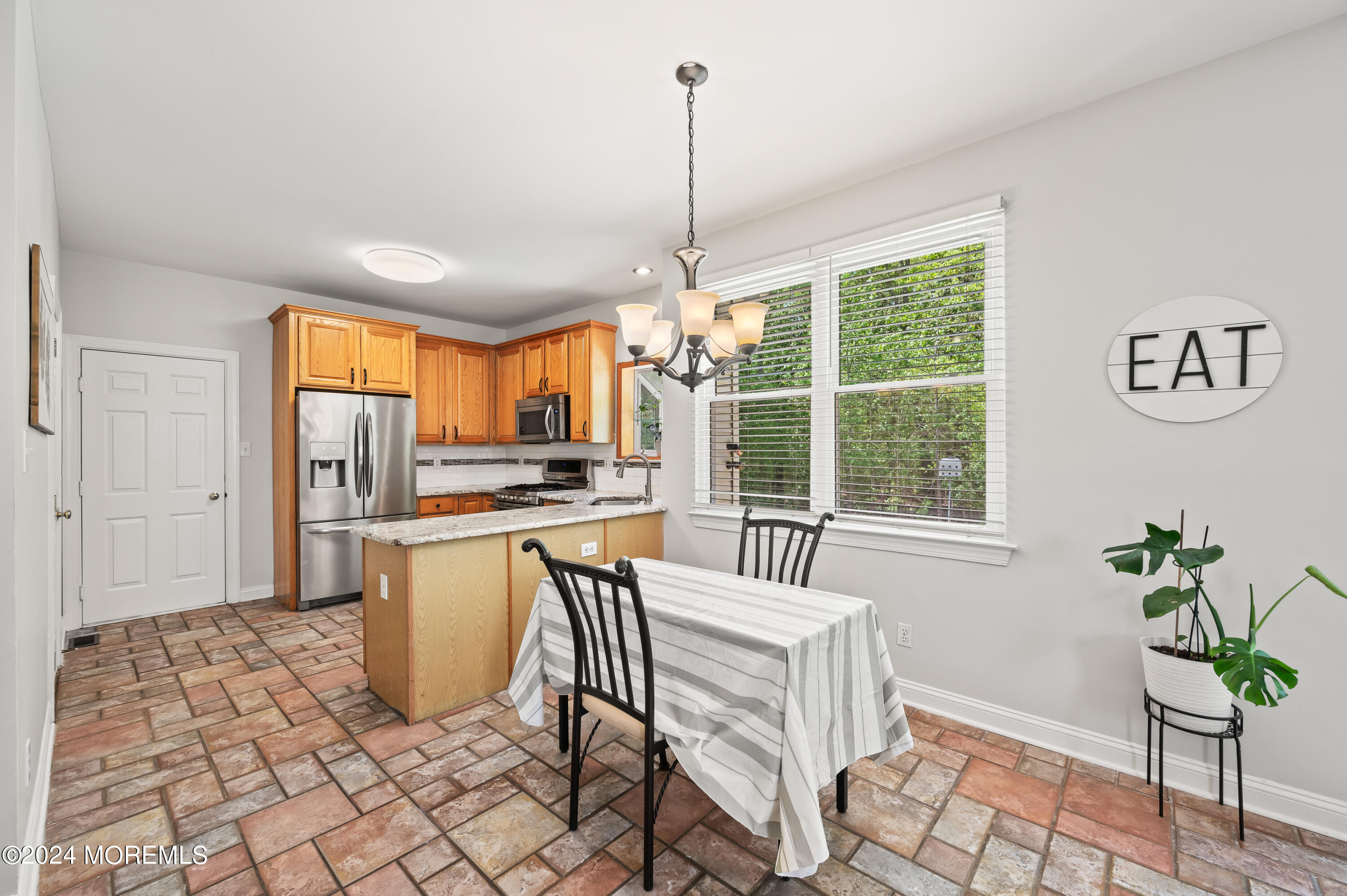 52 Danella Way Howell, NJ 07731 - Photo 16 of 42 a dining room with furniture and window