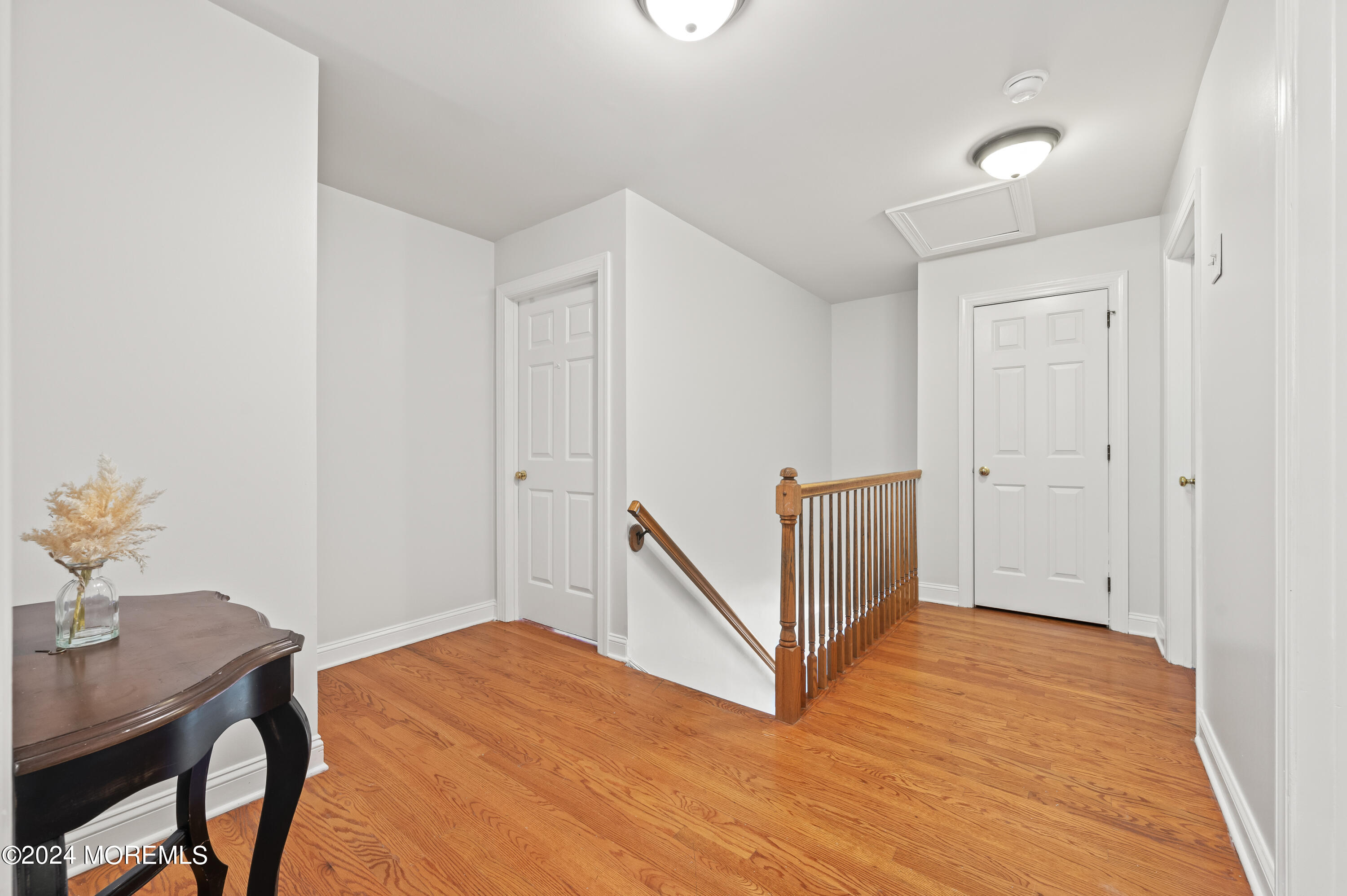 52 Danella Way Howell, NJ 07731 - Photo 20 of 42 a view of a room with wooden floor