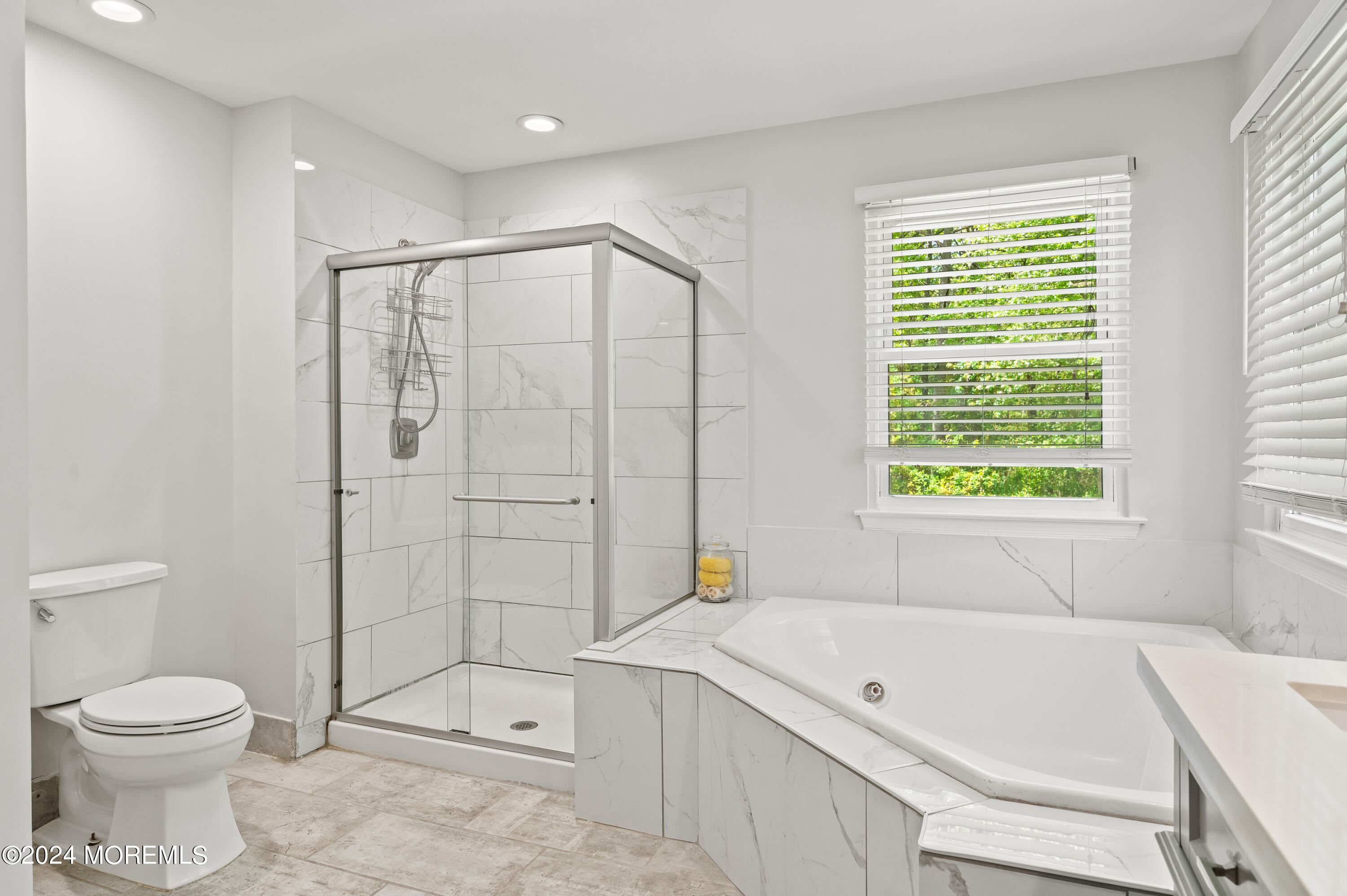 52 Danella Way Howell, NJ 07731 - Photo 27 of 42 a bathroom with a sink toilet and bathtub