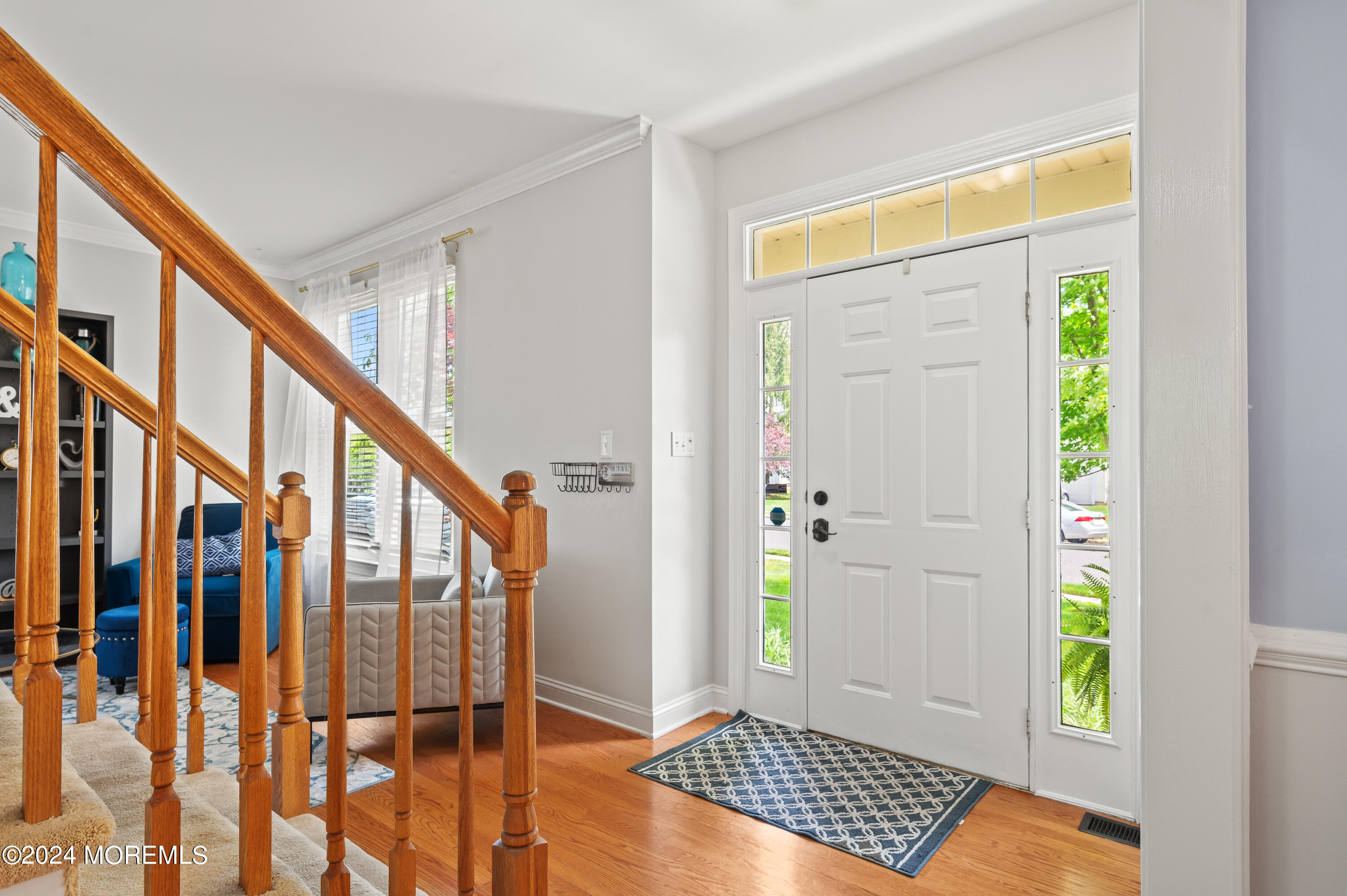 52 Danella Way Howell, NJ 07731 - Photo 3 of 42 a view of an entryway with wooden floor