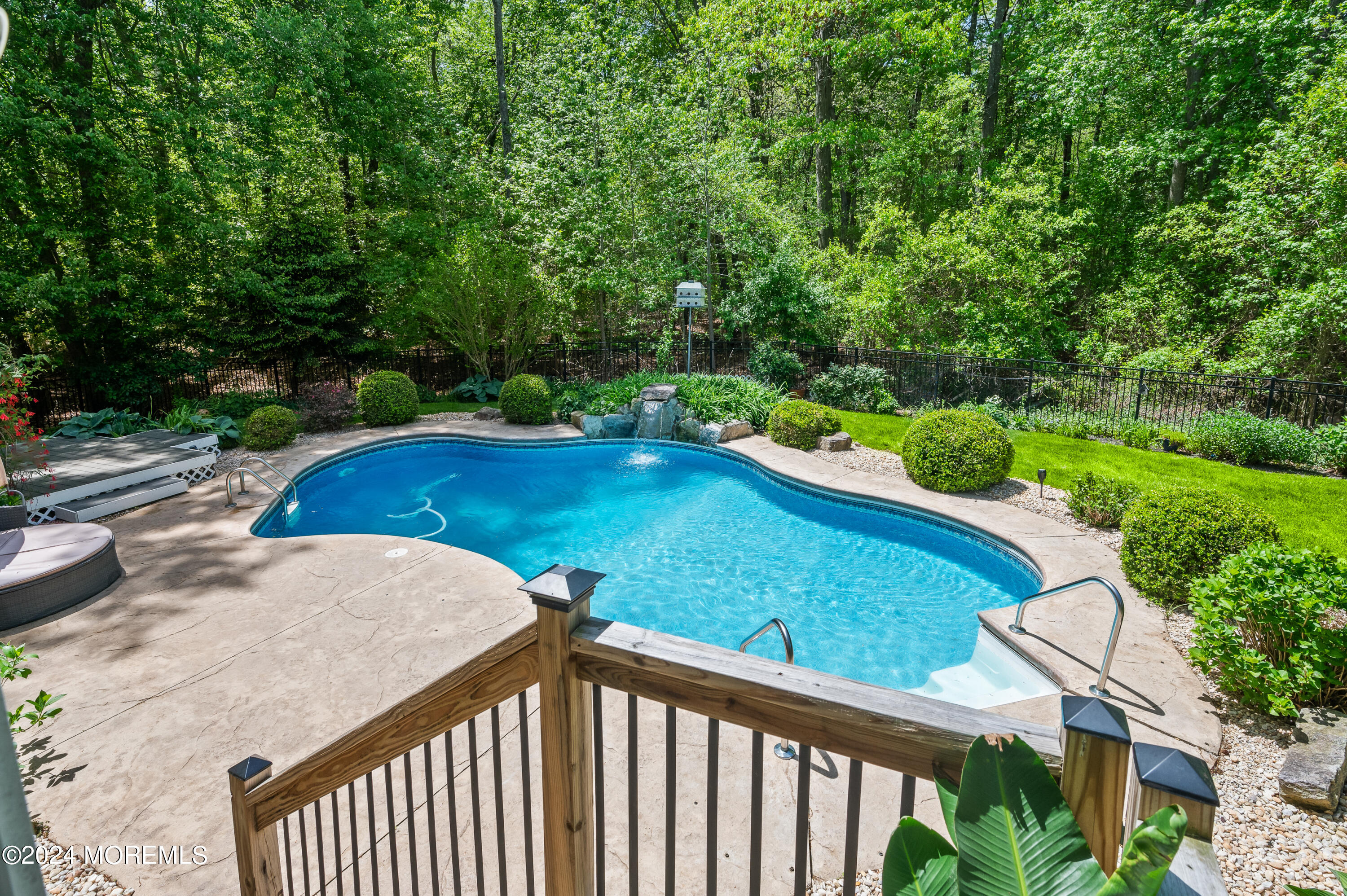 52 Danella Way Howell, NJ 07731 - Photo 32 of 42 a view of a swimming pool with a yard