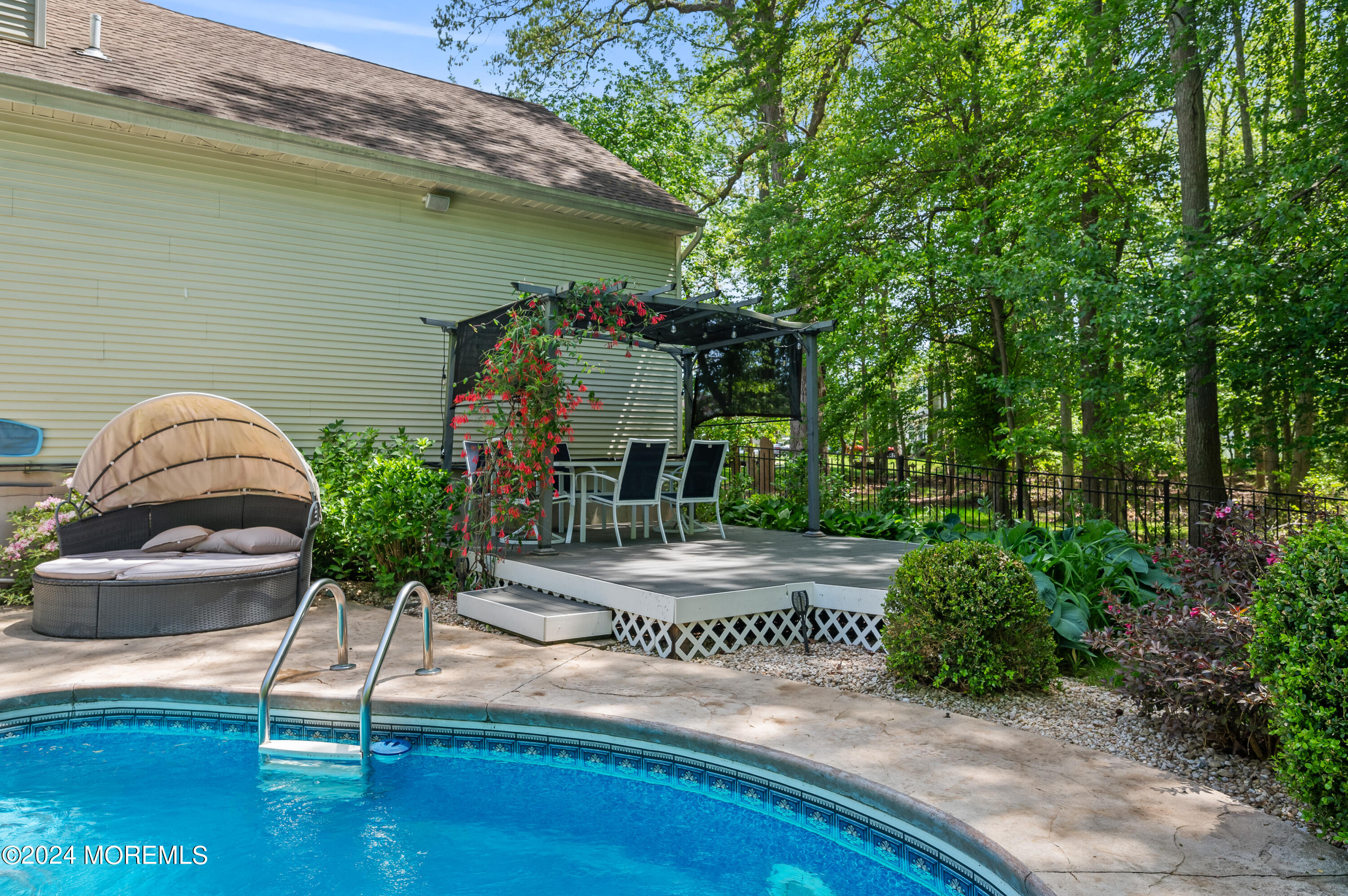 52 Danella Way Howell, NJ 07731 - Photo 33 of 42 a front view of a house with garden