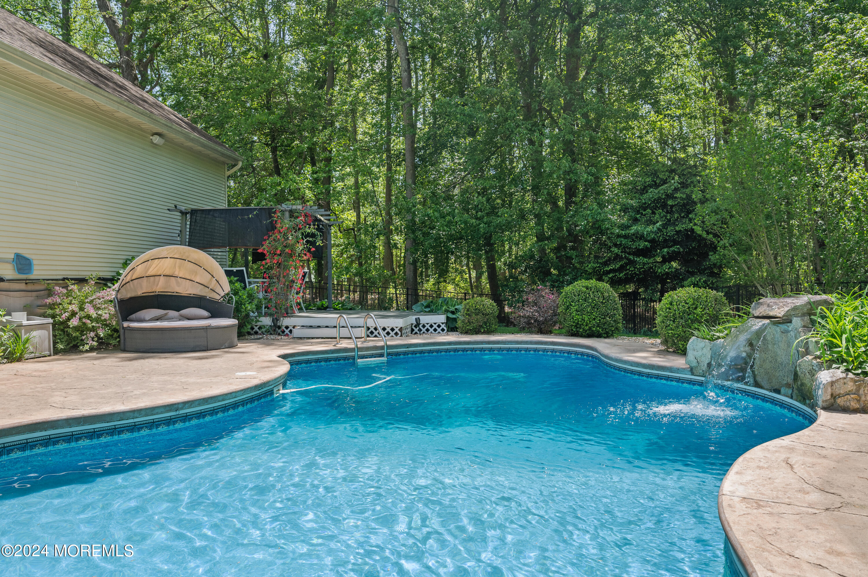 52 Danella Way Howell, NJ 07731 - Photo 34 of 42 a view of a swimming pool with a patio