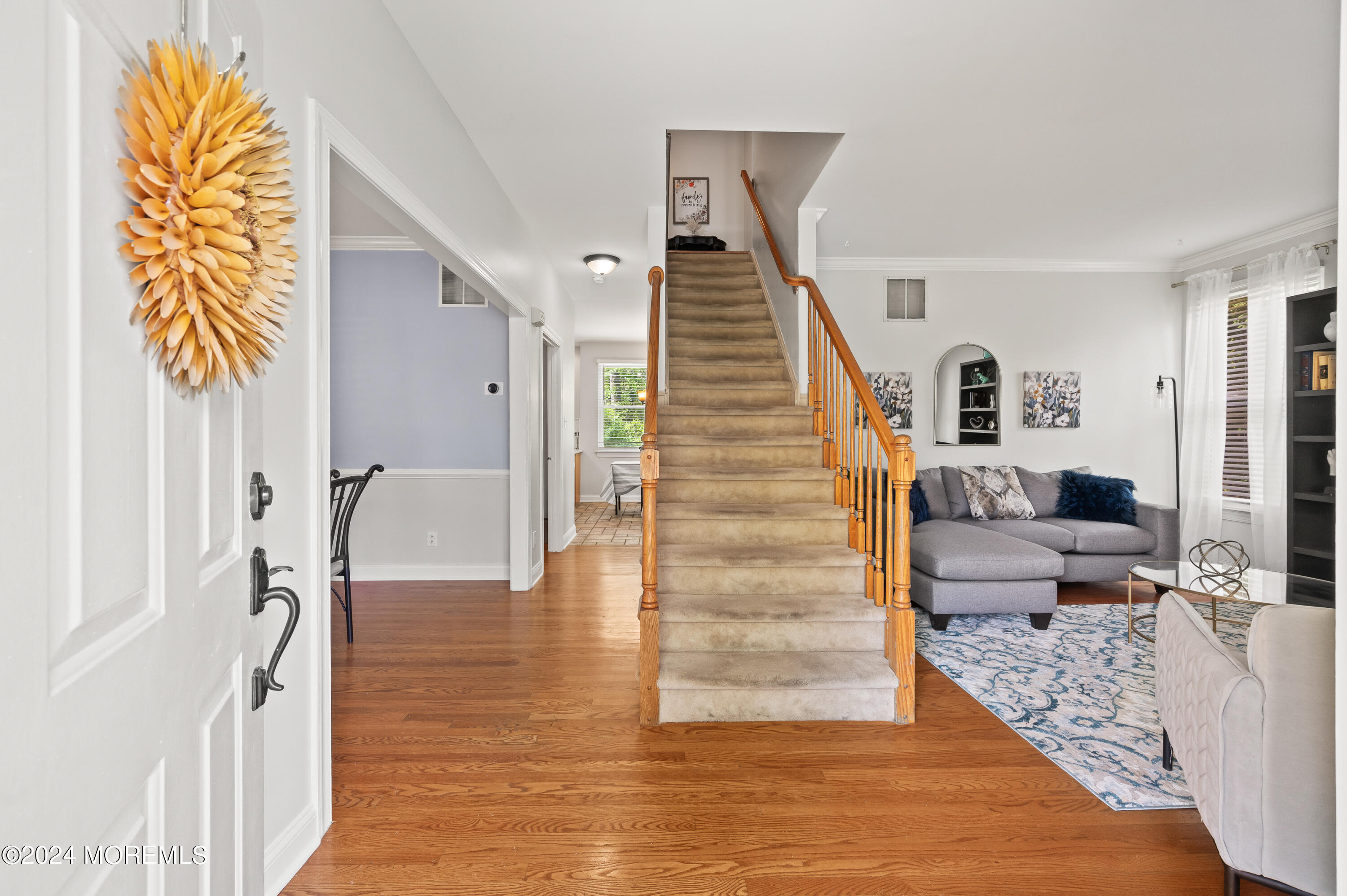 52 Danella Way Howell, NJ 07731 - Photo 4 of 42 a view of entryway and hall with wooden floor