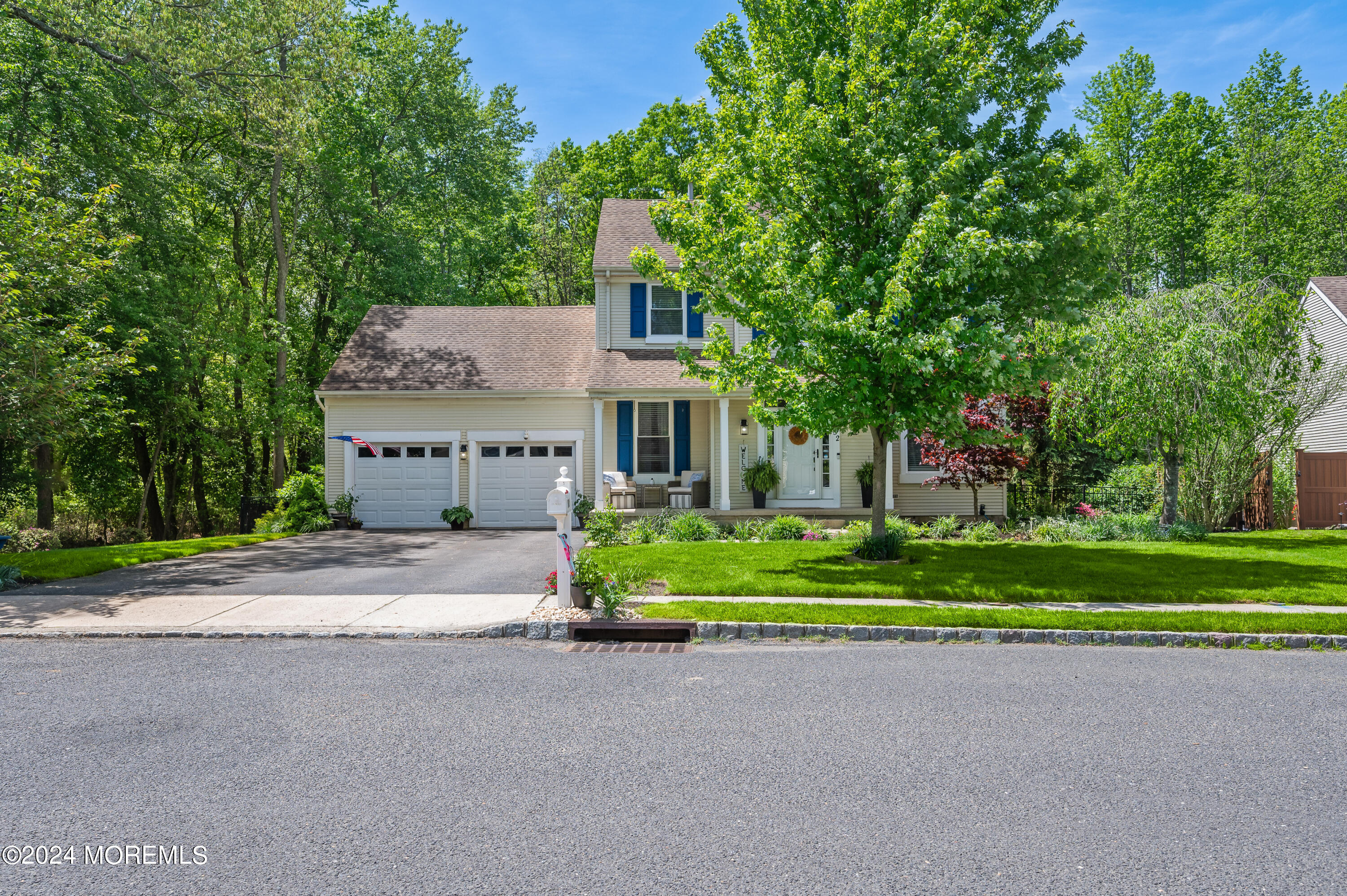 52 Danella Way Howell, NJ 07731 - Photo 42 of 42 a front view of a house with a yard and trees