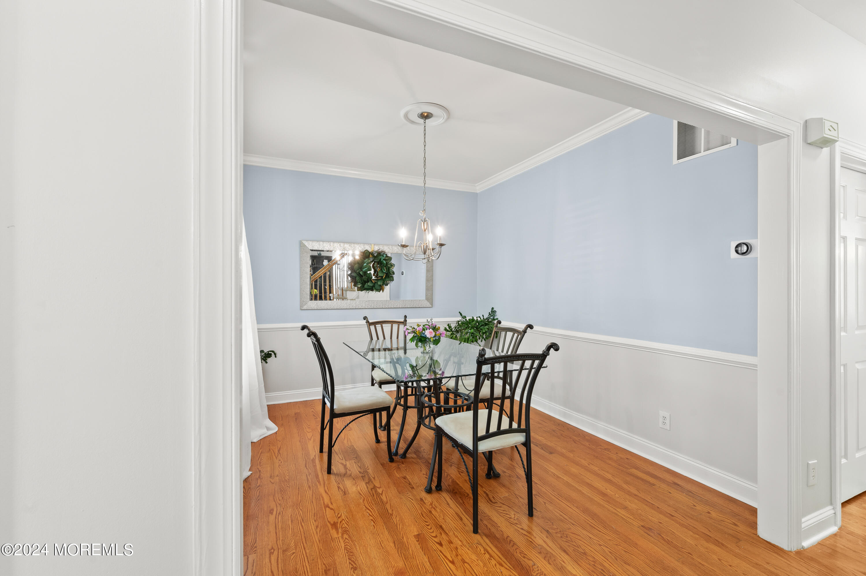 52 Danella Way Howell, NJ 07731 - Photo 8 of 42 a view of a dining room with furniture and wooden floor