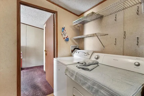 a bathroom with a granite countertop sink a vanity and shower