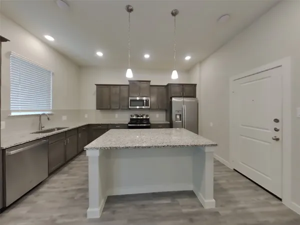 $2,379 | 9835 Willow Creek, Unit 502, Tomball, TX 77375