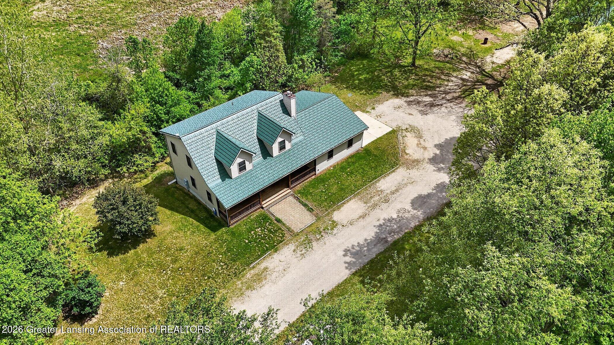 1300 East Round Lake Road Dewitt, MI 48820 - Photo 50 of 59 49-1300-E-Round-Lake-Rd-WindowStill-Phot