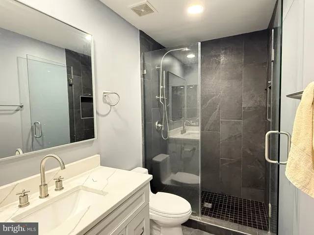 a room with furniture and gym equipment