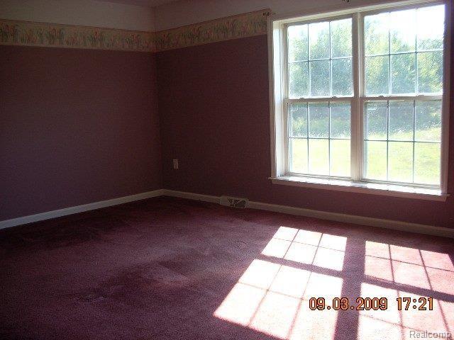 10264 Betterly Road Howell, MI 48855 - Photo 7 of 9 Master Bedroom