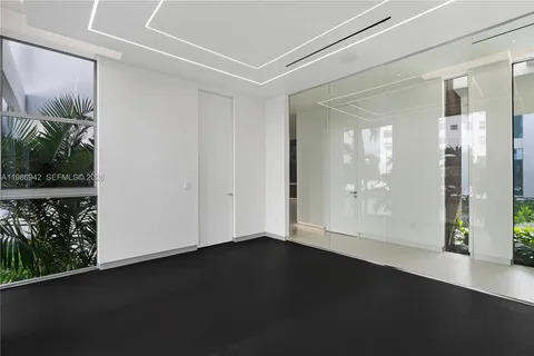 a view of a lake with sitting area