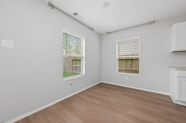 an empty room with windows