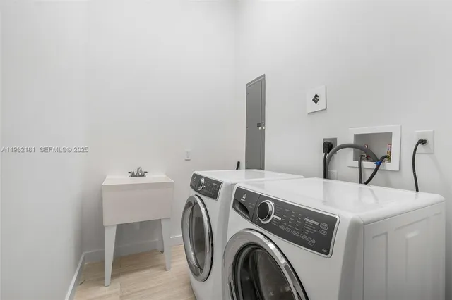 a utility room with dryer and washer