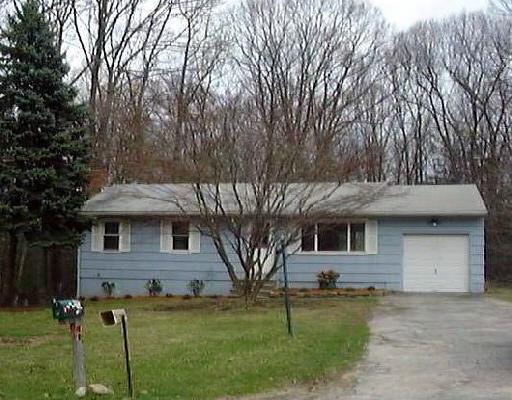 23 Flax Hill Road Brookfield, CT 06804 - Photo 1 of 1 a front view of a house with garden