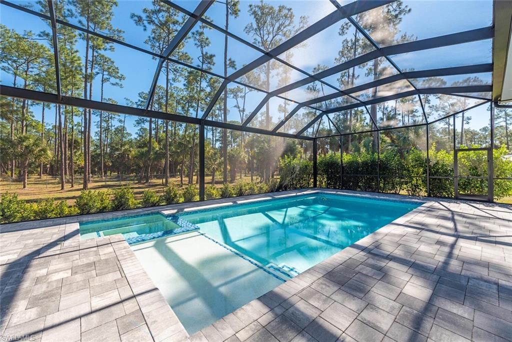 662 9th Street Southwest Naples, FL 34117 - Photo 13 of 34 a view of yard with a patio