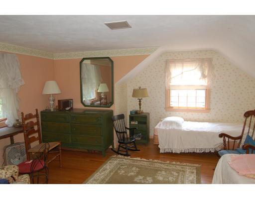 101 Chalmers Street Springfield, MA 01118 - Photo 11 of 19 a living room with furniture and a window
